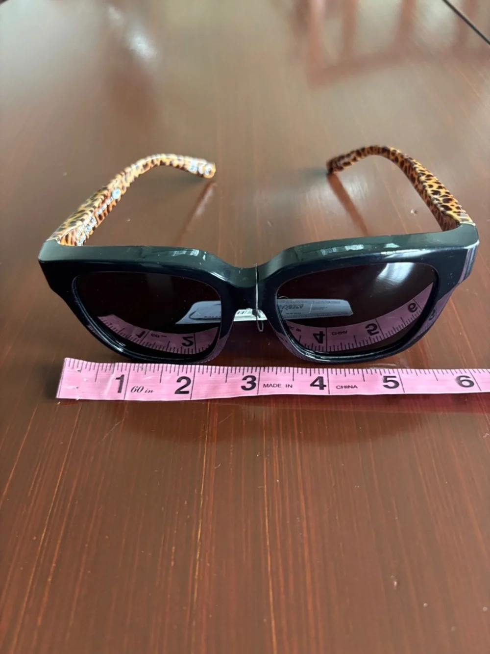 Foster Grant Solar Shield polarized,tortoise shell leopard arms,black frame/lens